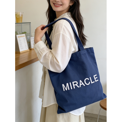 藏藍色字母帆布包女大容量單肩包手提托特包通勤包學生補習裝書包
