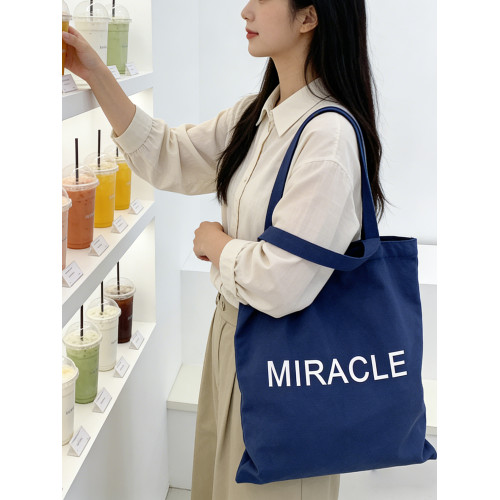 藏藍色字母帆布包女大容量單肩包手提托特包通勤包學生補習裝書包