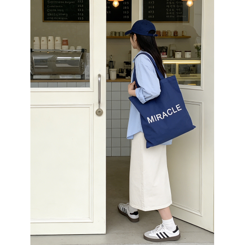 藏藍色字母帆布包女大容量單肩包手提托特包通勤包學生補習裝書包