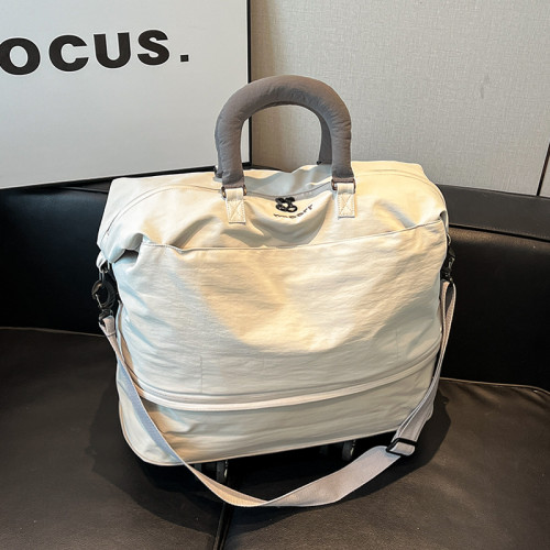 可拆卸萬向輪旅行包女手提時尚大容量輕便旅遊出差折曡收納行李包