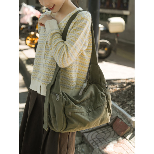 日系慵懶風帆布包包女2025秋冬新款通勤單肩托特包男文藝生斜後後背包