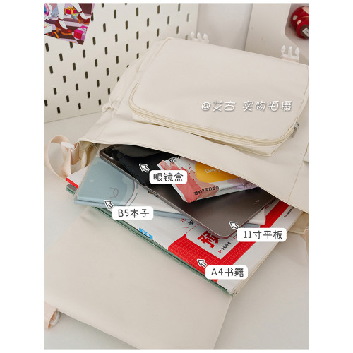 日系帆布簡約中大童痛包吧唧穀子初中單肩休閒斜背小衆補習包男包