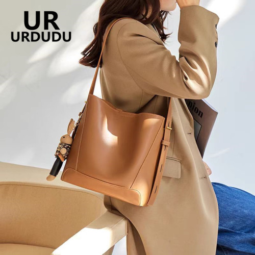 URDUDU真皮水桶包單肩斜後後背包女2026新款休閒百搭大容量通勤托特包 URDUDU真皮水桶包單肩斜後後背包女2026新款休閒百搭大容量通勤托特包
