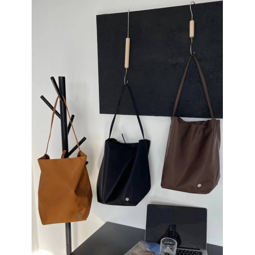 慵懶風復古尼龍布水桶包2025新款百搭托特包大容量單肩學生上課包