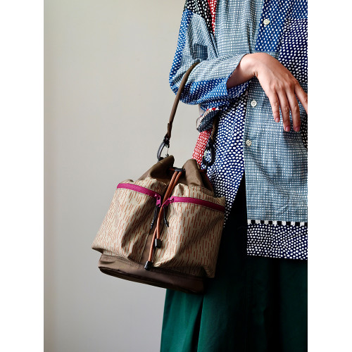 housedesign原創2026新款露營拼接斜後後背包多口袋工裝輕便水桶包女