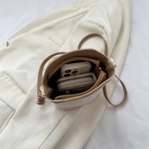 潮流流行時尚小清新洋氣草編包女2023夏編織蕾絲水桶包單肩斜後後背包