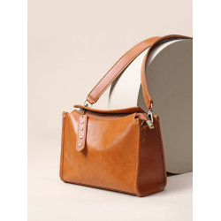 那馳植鞣頭層牛皮枕頭包2026新款冬天通勤包復古單肩包寬帶斜後後背包