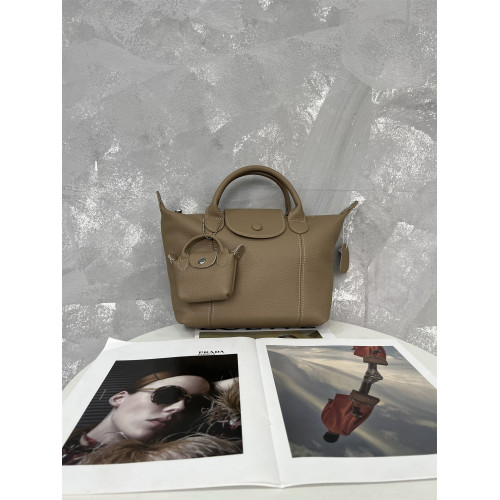 經典爆款頭層牛皮高級感2025新款通勤包手提包餃子包單肩斜背女包