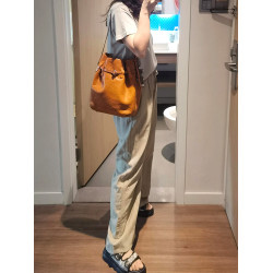 棕色真皮大容量托特包包女2026新款輕奢小衆高級感單肩斜背水桶包