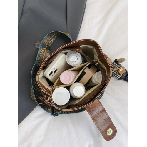 小衆韓版復古秋冬百搭通勤寬肩帶斜後後背包包女2024新款高級感水桶包