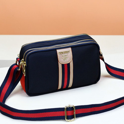 斜背牛津布包包女撞色配皮小方包2025歐美時尚新款多層休閒單肩包