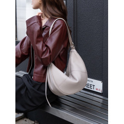 頭層牛皮餃子包2025新款小衆設計單肩斜後後背包高級感大容量腋下女包