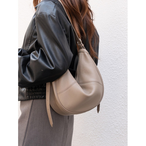 頭層牛皮餃子包2025新款小衆設計單肩斜後後背包高級感大容量腋下女包