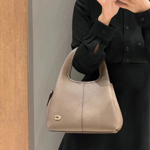 香港2026新款女包真皮菜籃子單肩斜背時尚大容量簡約手提水桶包