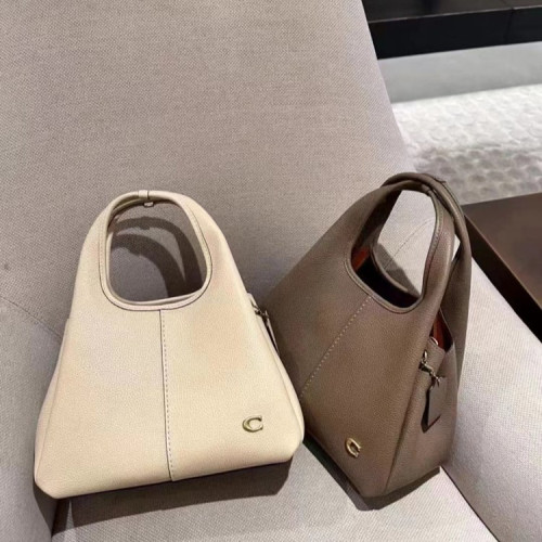 香港2026新款女包真皮菜籃子單肩斜背時尚大容量簡約手提水桶包