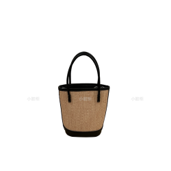 小髒櫃 2025夏季新款法式小衆時尚撞色草編包手提單肩斜背水桶包