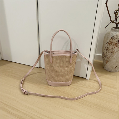 小髒櫃 2025夏季新款法式小衆時尚撞色草編包手提單肩斜背水桶包