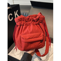 時尚休閒束口尼龍布水桶包女2025冬季新款韓版ins潮流百搭單肩包