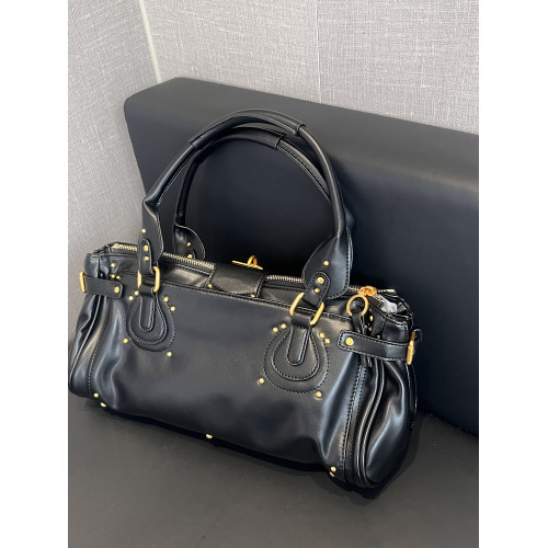 機車鎖頭包黑色鉚釘手提包百搭通勤波士頓包植鞣軟皮高級感單肩包 機車鎖頭包黑色鉚釘手提包百搭通勤波士頓包植鞣軟皮高級感單肩包