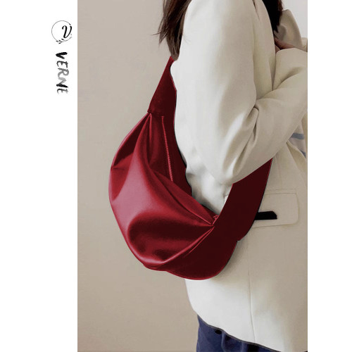 紅色雲朵包包女式2026爆款超火新款高級感休閒百搭真皮斜背餃子包