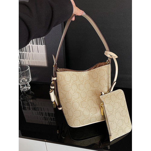 時尚百搭手提小包包2026洋氣新款撞色休閒水桶包網紅高級感斜後後背包