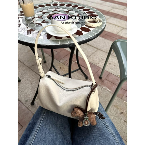 【AAN】包包女式2025新款頭層牛皮筆筒包高級感枕頭包單肩手提包