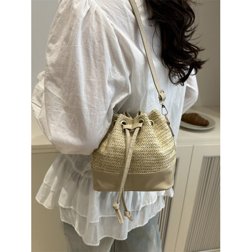 編織草編包包女士2025新款夏季百搭斜背海邊度假沙灘包手提水桶包