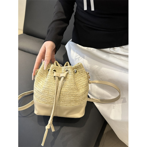 編織草編包包女士2025新款夏季百搭斜背海邊度假沙灘包手提水桶包