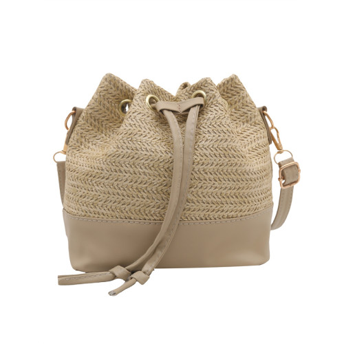 編織草編包包女士2025新款夏季百搭斜背海邊度假沙灘包手提水桶包