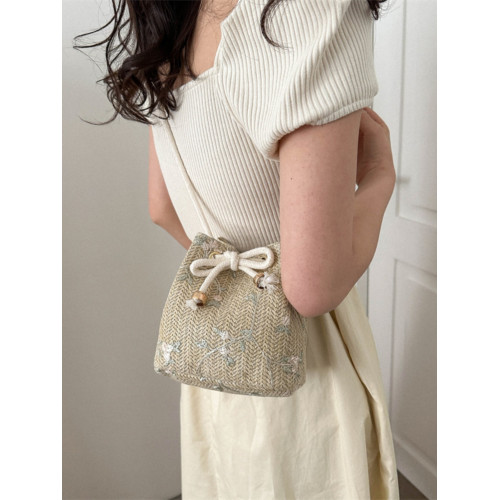 編織包包女2025春夏新款潮時尚網紅沙灘草編包ins百搭斜背水桶包 編織包包女2025春夏新款潮時尚網紅沙灘草編包ins百搭斜背水桶包