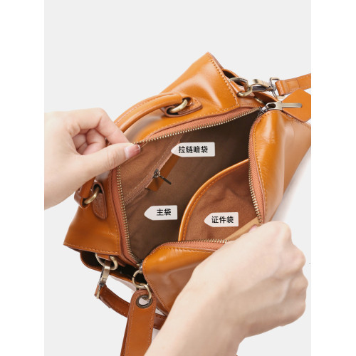 頭層牛皮枕頭包2026新款植鞣皮小方包復古大容量手提包寬帶斜後後背包