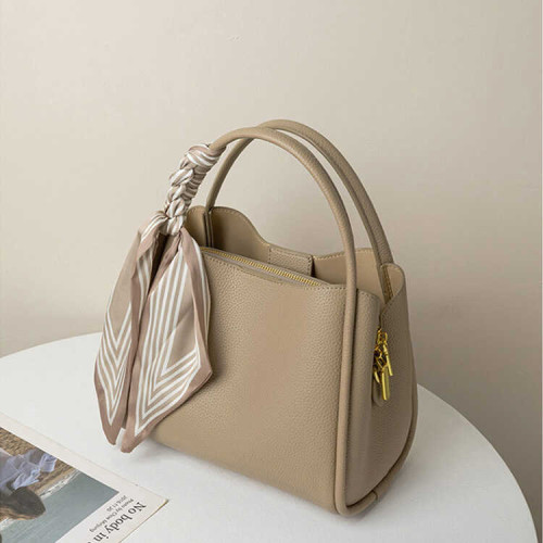 香港爆款手提包女2024新款真皮菜籃子水桶包小衆輕奢斜背小包