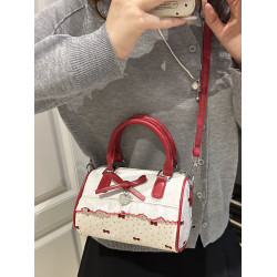 甜美蝴蝶結手提小包包女2025新款時尚蕾絲邊枕頭包夏季帆布斜後後背包