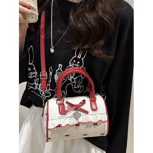 甜美蝴蝶結手提小包包女2025新款時尚蕾絲邊枕頭包夏季帆布斜後後背包