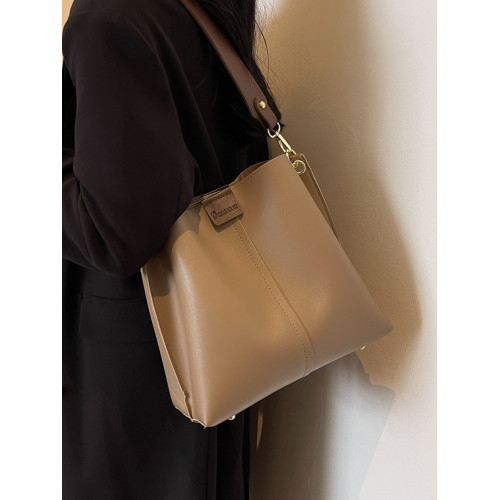 手提包包女士2025新款秋冬時尚百搭水桶包小衆通勤高級質感單肩包 手提包包女士2025新款秋冬時尚百搭水桶包小衆通勤高級質感單肩包