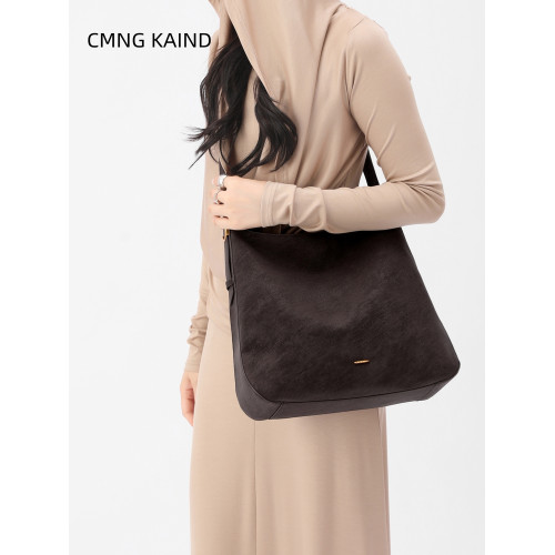CMNG KAIND小衆水桶包女2026新款大容量牛皮托特包通勤斜背單肩包 CMNG KAIND小衆水桶包女2026新款大容量牛皮托特包通勤斜背單肩包