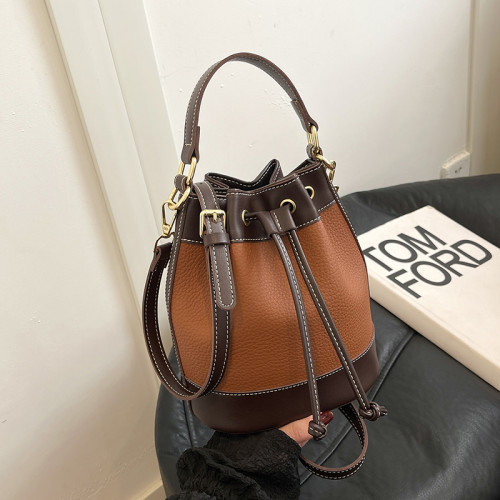 今年流行小衆設計包包2024新款女包時尚百搭斜後後背包通勤手拎水桶包 今年流行小衆設計包包2024新款女包時尚百搭斜後後背包通勤手拎水桶包