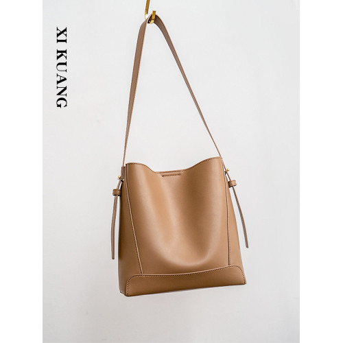 水桶包2025秋冬新款單肩通勤包百搭牛皮大容量托特包斜背真皮女包