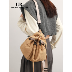 UR簡約抽繩水桶包女2025夏季新款尼龍布輕便手提包百搭單肩斜後後背包