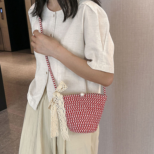 編織包女草編包包2023新款潮時尚百搭ins斜後後背包海邊度假包水桶包