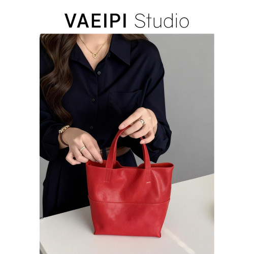 頭層植鞣牛皮手提包女2026新款小衆設計水桶包單肩斜背百搭女包潮