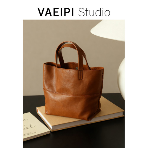 頭層植鞣牛皮手提包女2026新款小衆設計水桶包單肩斜背百搭女包潮