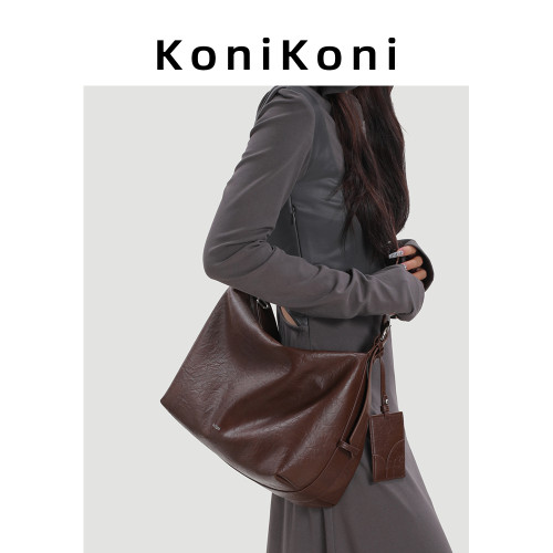 KoniKoni真皮小衆大容量托特包女慵懶通勤斜後後背包2026新款單肩大包
