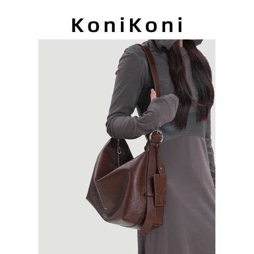 KoniKoni真皮小衆大容量托特包女慵懶通勤斜後後背包2026新款單肩大包