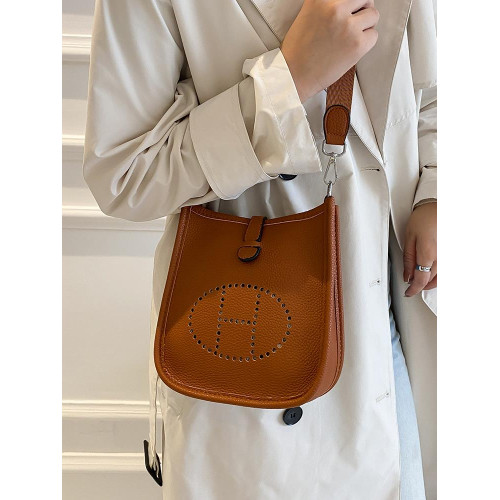 h家伊芙琳高品質軟皮鏤空水桶包女士復古質感百搭單肩斜背通勤