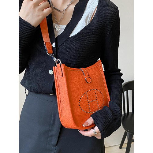 h家伊芙琳高品質軟皮鏤空水桶包女士復古質感百搭單肩斜背通勤