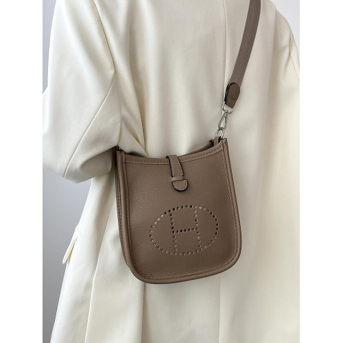 h家伊芙琳高品質軟皮鏤空水桶包女士復古質感百搭單肩斜背通勤