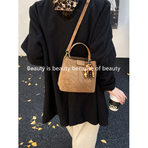 高級感爆款小包包女式2026秋冬新款潮時尚單肩手提包斜後後背包水桶包