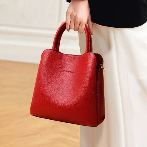 香港真皮包包女2025新款小水桶包女士媽媽手提包單肩包百搭斜後後背包