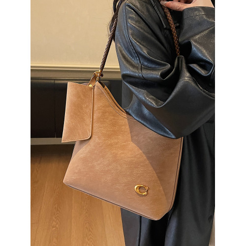 簡約質感通勤小包包女2026新款百搭ins單肩包春夏復古腋下水桶包